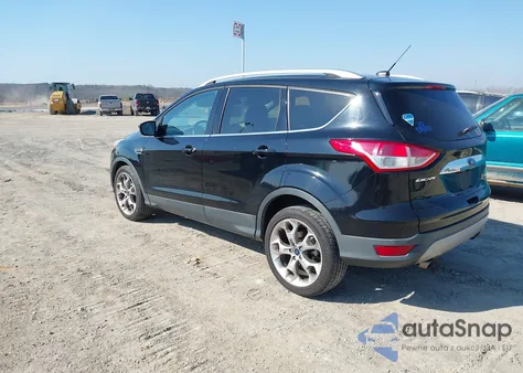 2016 Ford Escape Titanium z USA, uszkodzony, nr VIN 1FMCU0JX6GUC64657